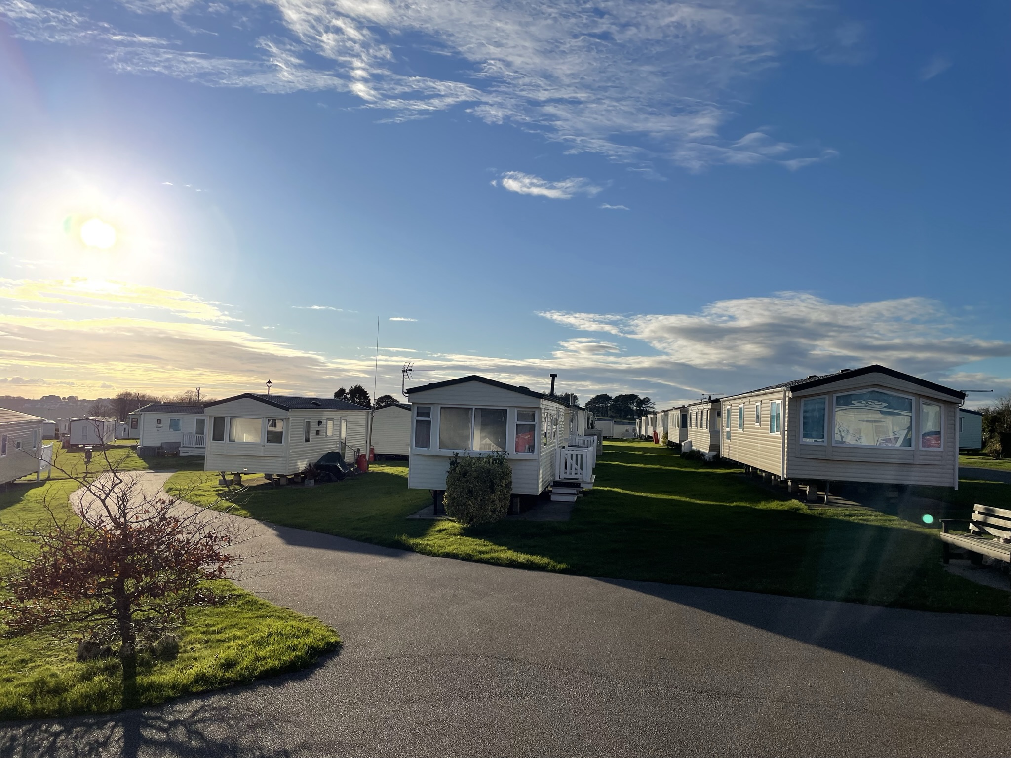 View over West Wayland Caravan Park and the Cornish coast